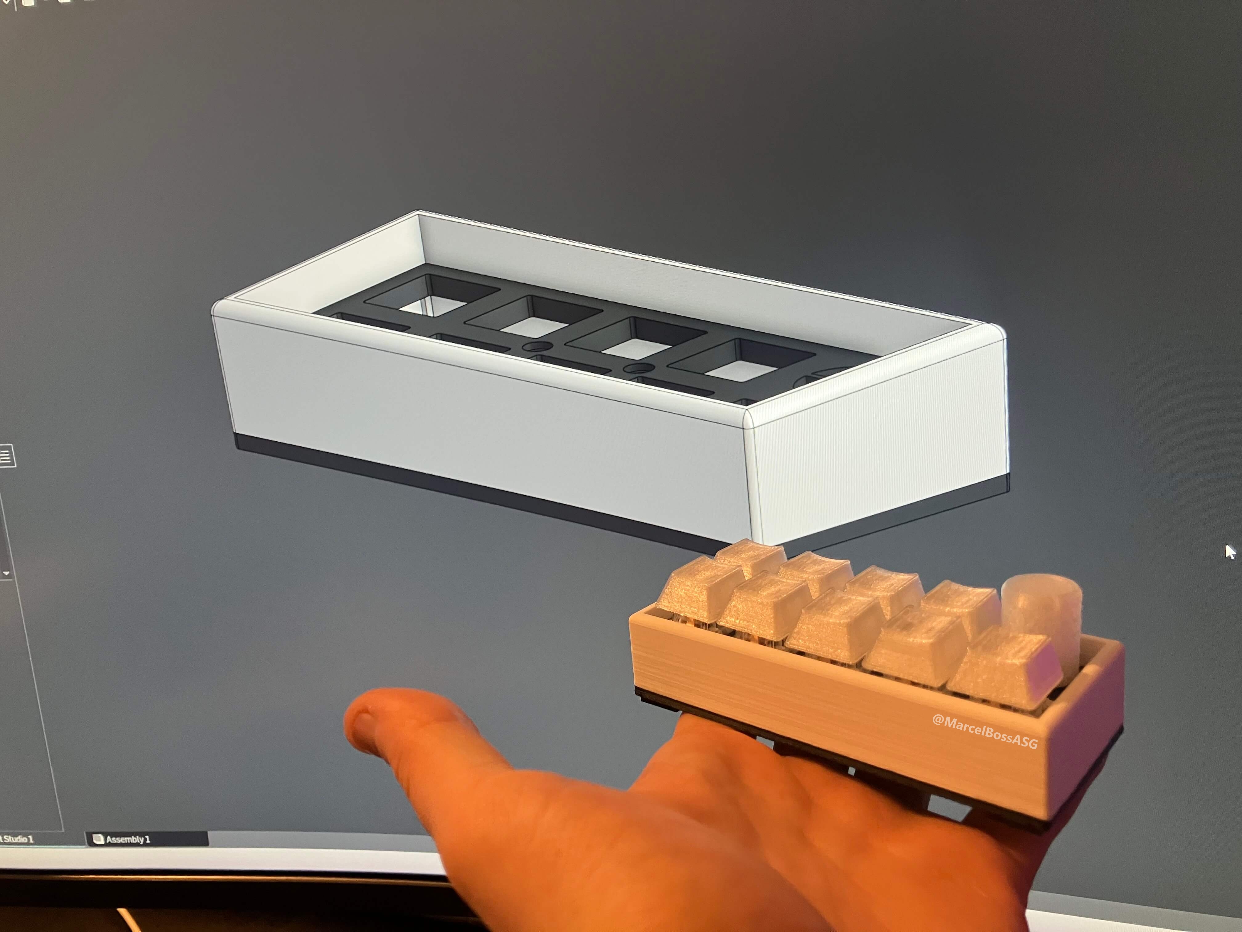 keypad with the cad design of the keypad in the background